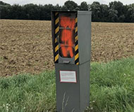 Spraypainted orange speed camera