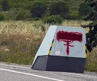 Red spraypainted photo radar