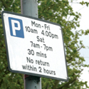 Parking restriction sign