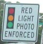 Red light camera sign